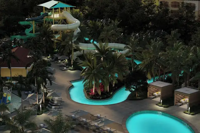 Ritz-Carlton Naples, Tiburón em Naples, área da piscina com tobogã e espreguiçadeiras